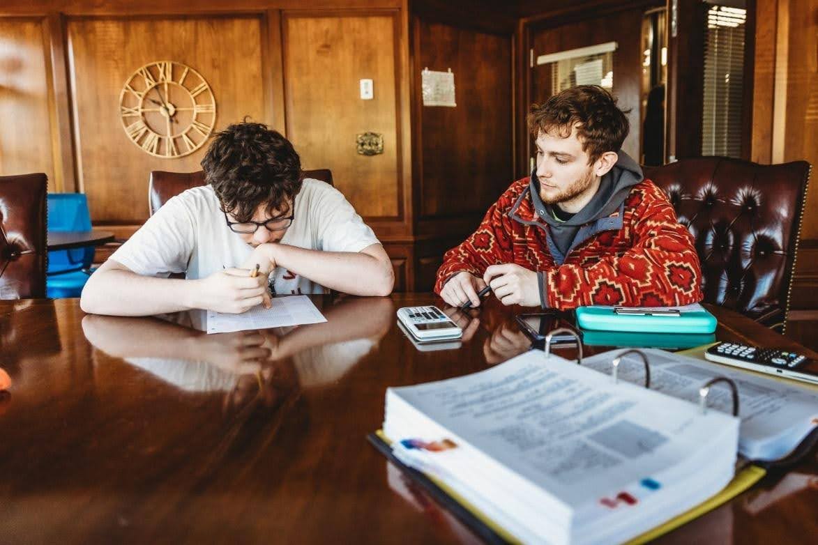 Students studying at table